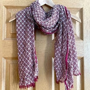 Cream and cranberry colored patterned scarf